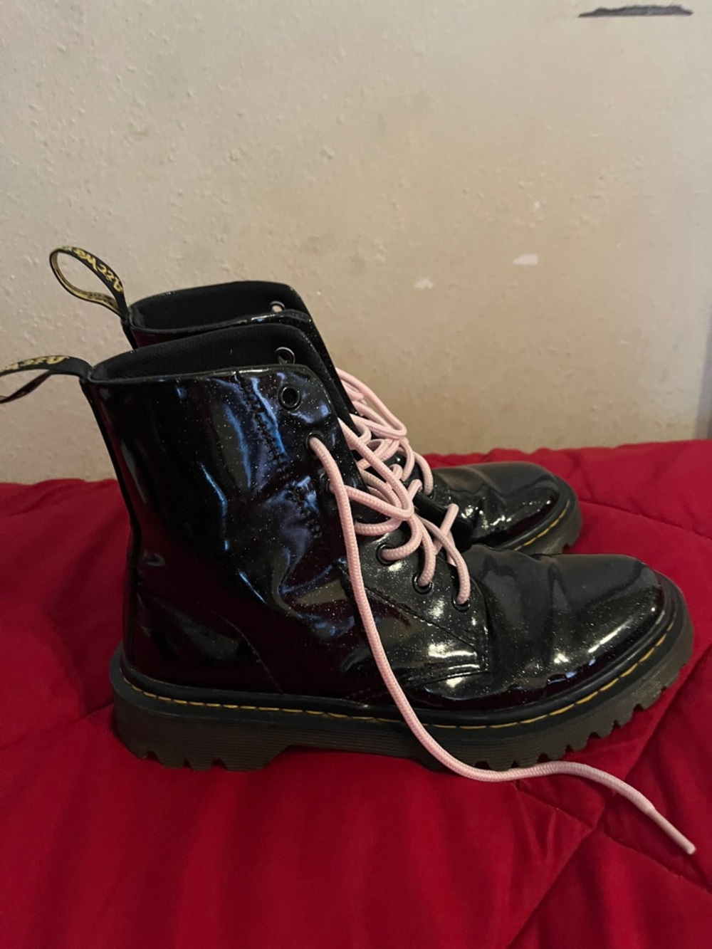 Dr. Martens Black Patent Combat Boots with Pink Laces